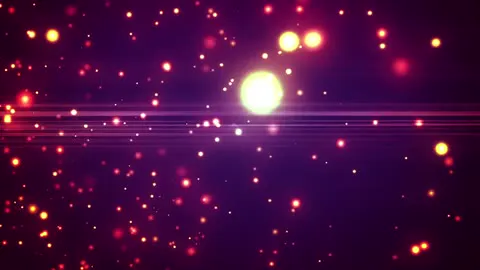 Red and orange particles drifting through the dark.