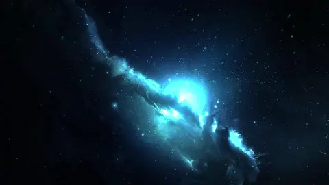 A blue galaxy turning far out in deep space.