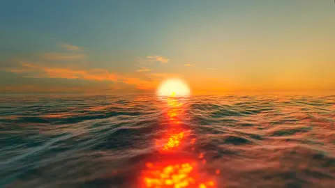 The sun setting into an open ocean horizon.